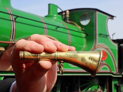 Brass horn reputed to be the one blown at the departure of the first passenger train in 1885